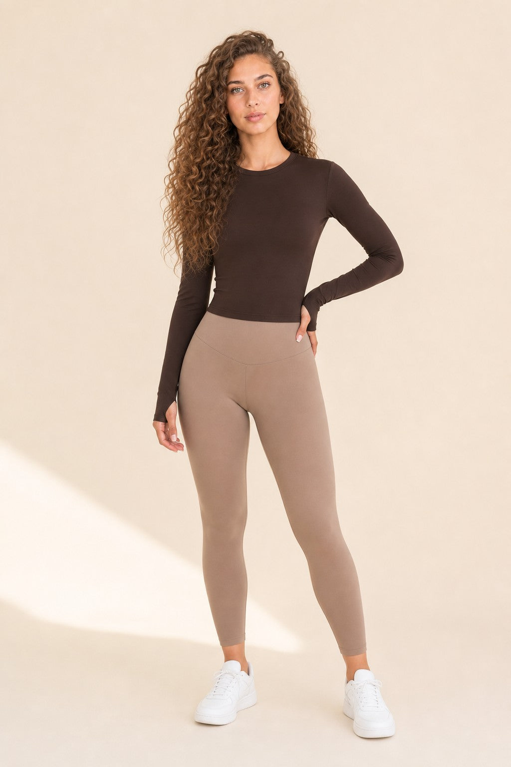 Model wearing NudeBlend Crew Neck Long Sleeve Top in Espresso - front