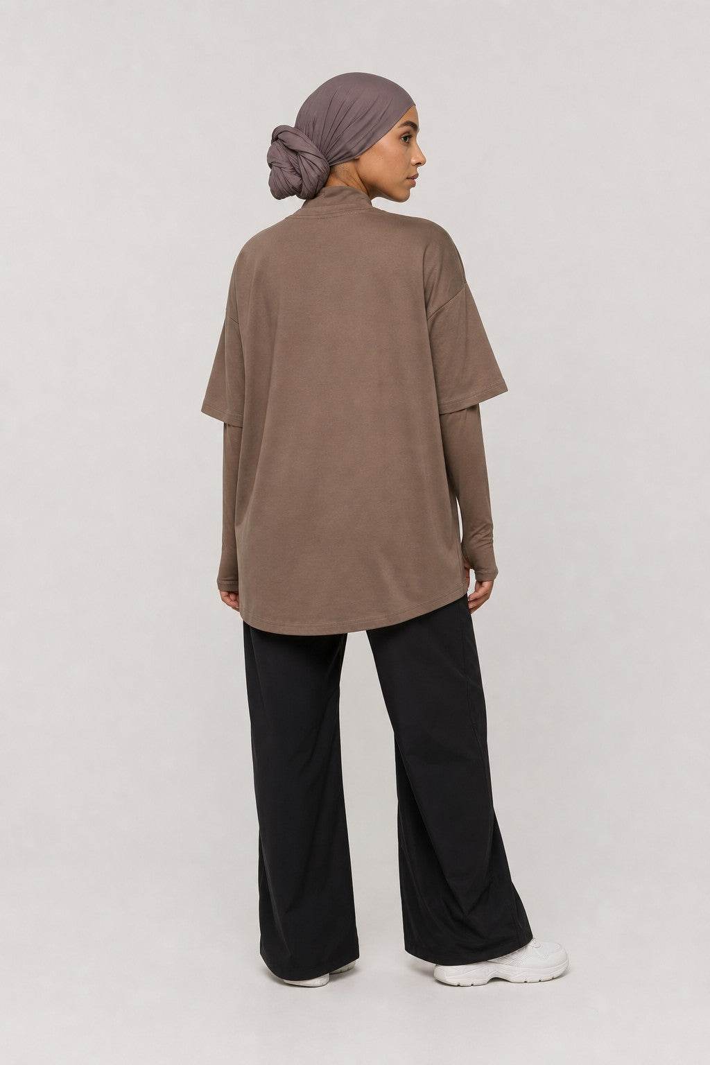 Model wearing NudeBlend Oversized Thumbhole Tee in Mocha - back