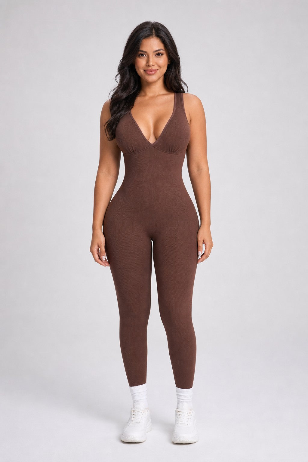 Model wearing NudeBlend Seamless Bodysuit in Espresso - front